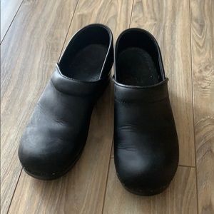 Dansko black leather clogs